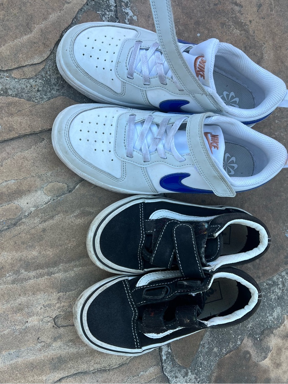Nike Kids White Sneakers with Blue Swoosh and Orange Logo